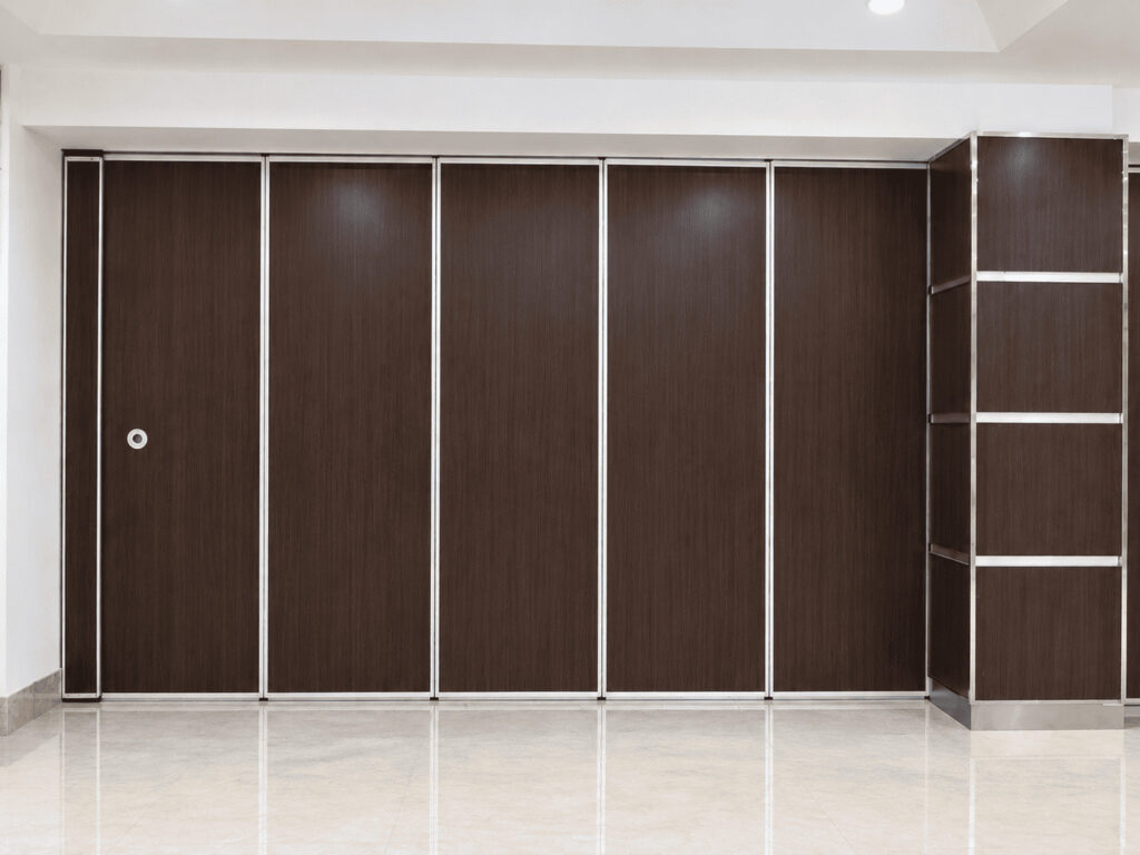 Sliding folding partition system for flexible commercial interiors in India